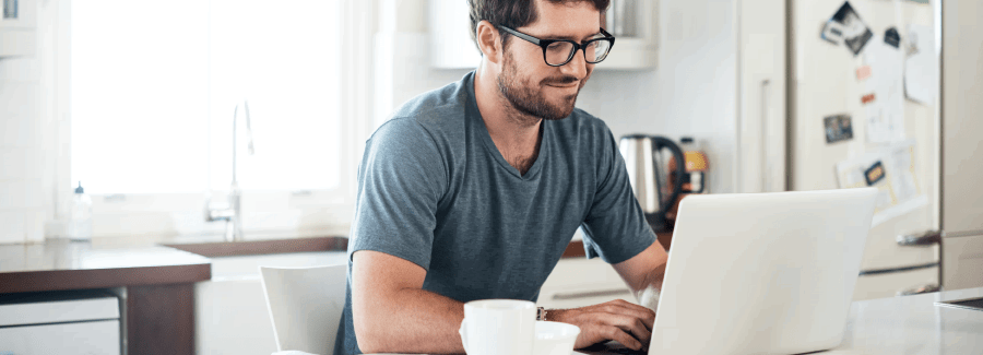Man typing on a laptop