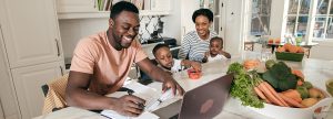 Family sitting at a desk