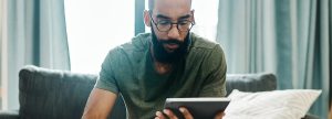 Man looking at a tablet