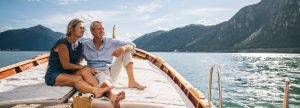 Elderly couple sitting on a boat
