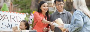 Couple buying an item at a yard sale