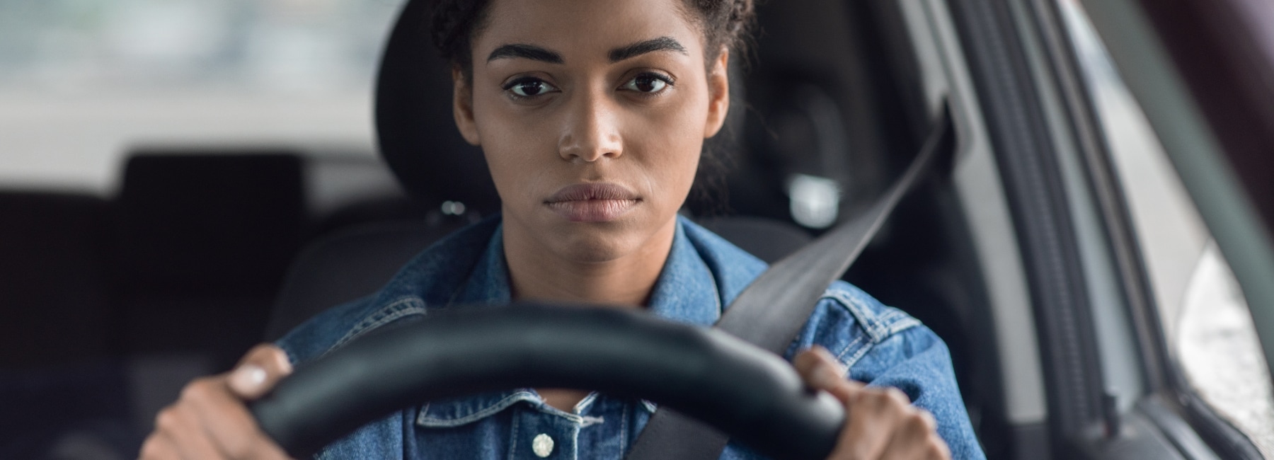 Woman in her car