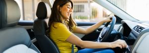 Woman sitting in her car