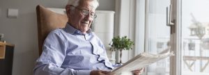 Old man reading the paper