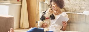 Woman holding her dog