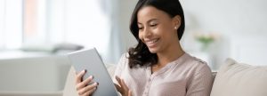 Woman holding a tablet