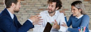 Couple talking to their banker
