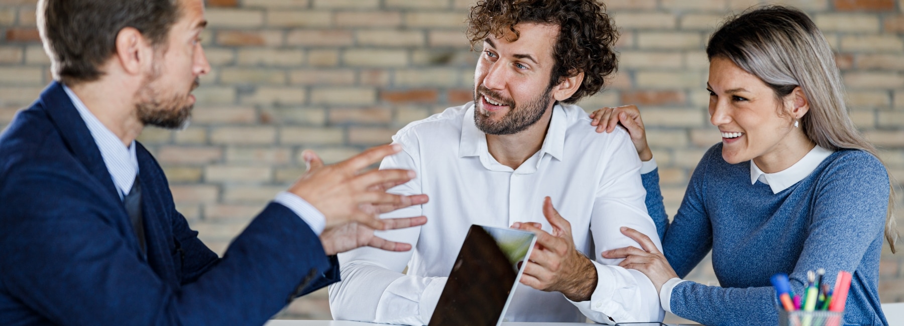 Couple talking to their banker
