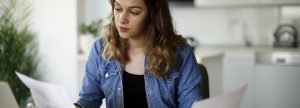 Woman filling taxes