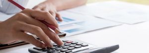 Woman using a calculator