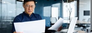 Man looking at his tax return